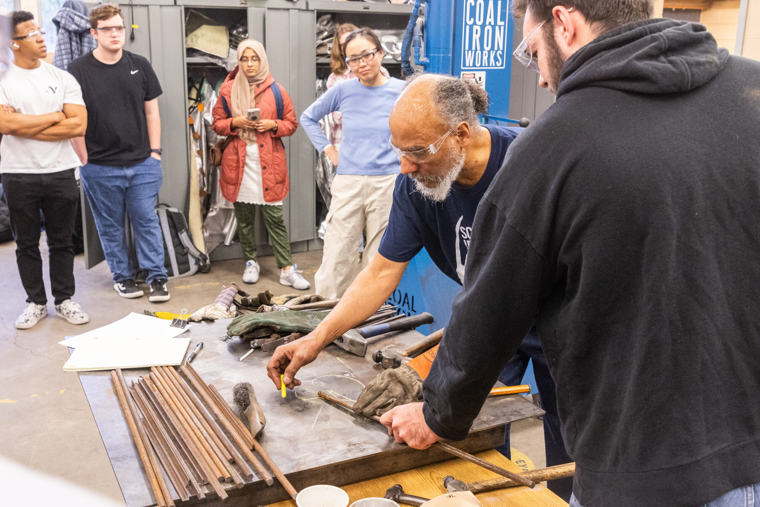 An instructor demonstrates in the lab.