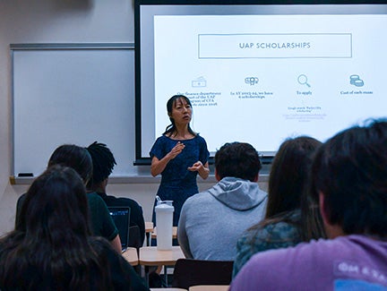 A faculty member presents scholarship opportunities to a classroom of BBA in Economics students at Georgia Southern