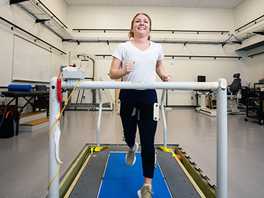 A Georgia Southern student participating in the Waters College of Health Professions' Tactical Athlete Initiative runs on a treadmill