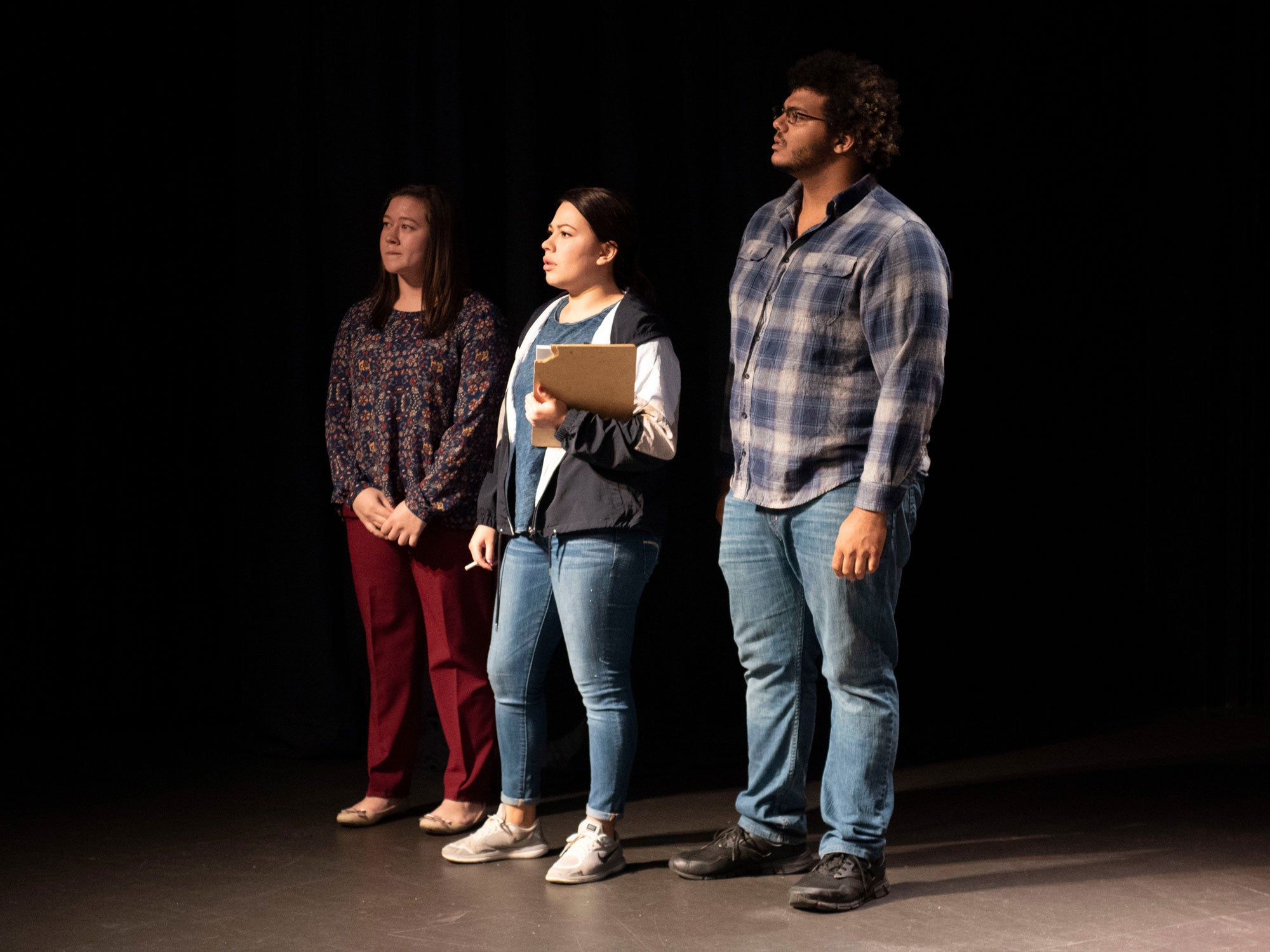 Three B.A. in Theatre students at Georgia Southern during a rehearsal for a production in a black box theater