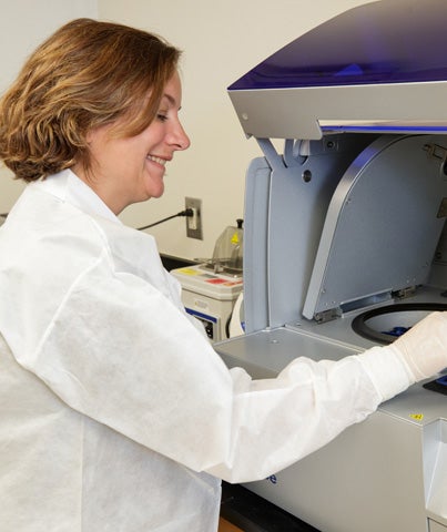 A faculty member from Georgia Southern's Jiann-Ping Hsu College of Public Health uses laboratory equipment to analyze samples for research