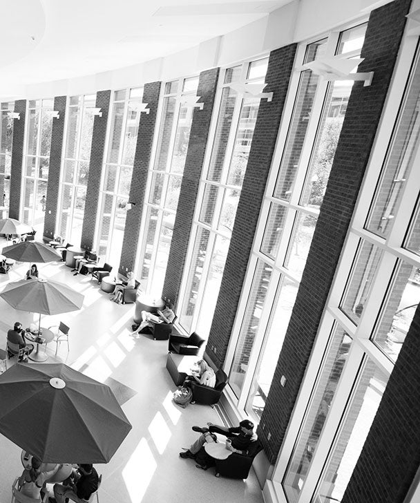 Windows lining a common area inside Georgia Southern's Parker College of Business building.