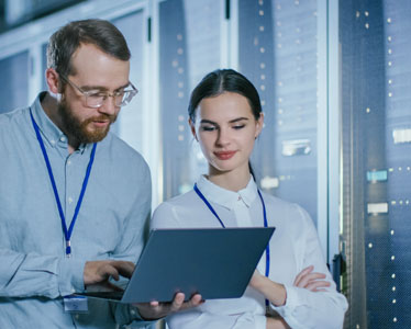 A B.S. in Information Technology student from Georgia Southern learns about network management during an internship.