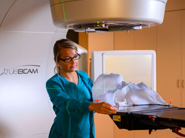 An instructor for Georgia Southern's B.S. in Radiologic Sciences program prepares professional imaging equipment for students.