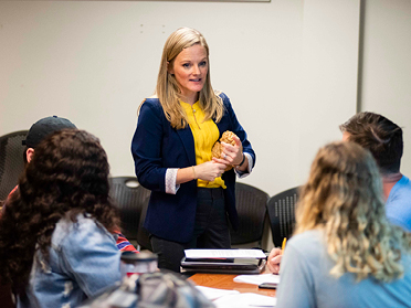 An area employer talks with students from Georgia Southern's M.S. in Kinesiology, Sport and Exercise Psychology program about related career paths