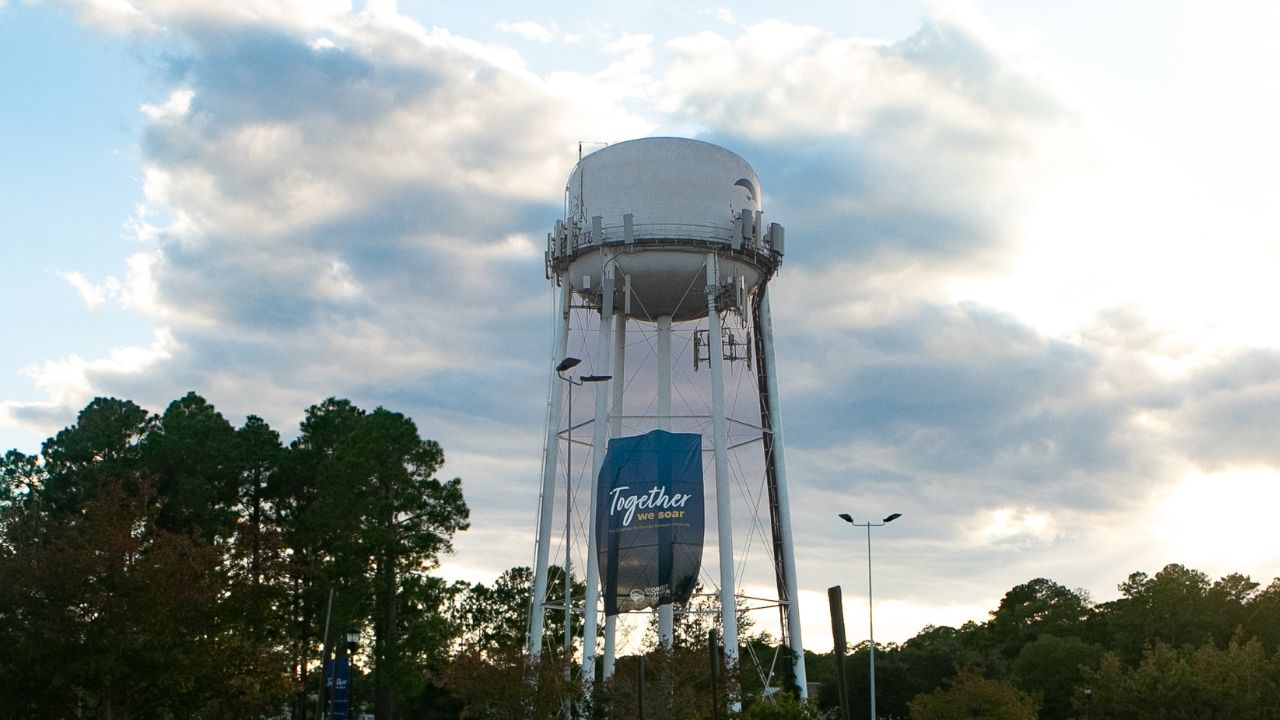 Water tower with the Together We Soar banner