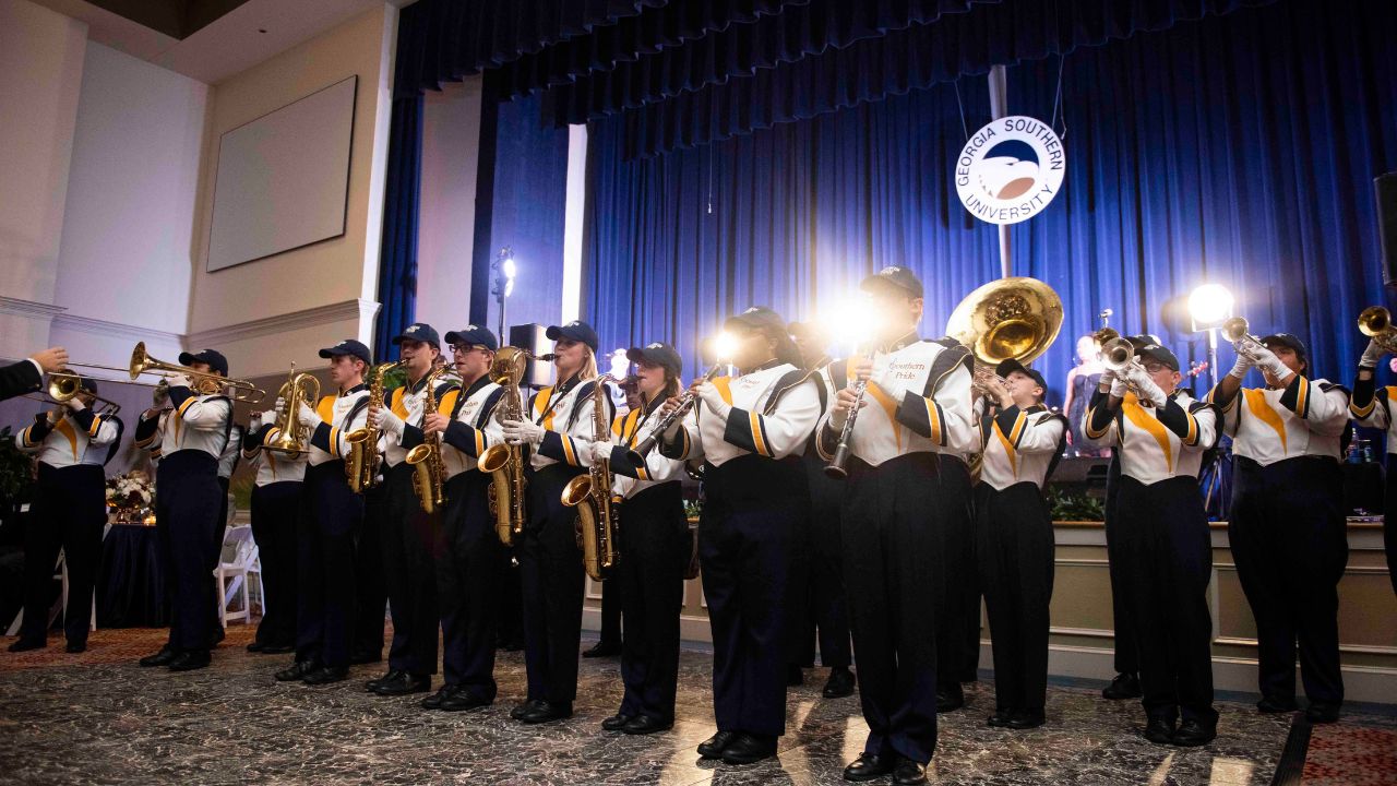 Photo of Southern Pride Marching Band performing at a Giving Society event