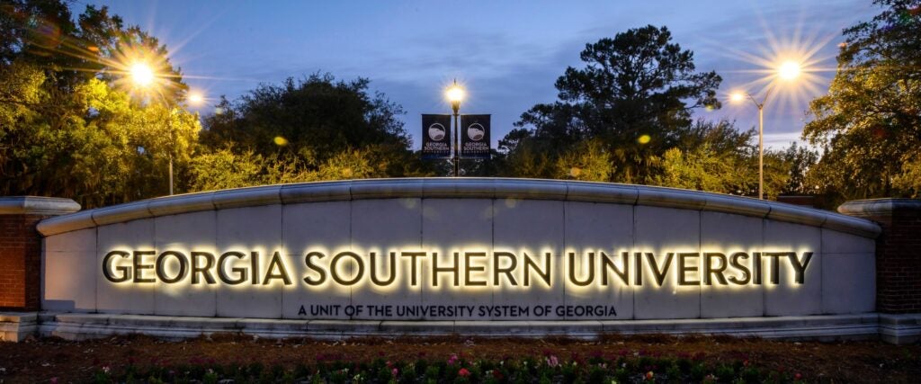 The sign, lit up at night, for Georgia Southern's Armstrong Campus in Savannah