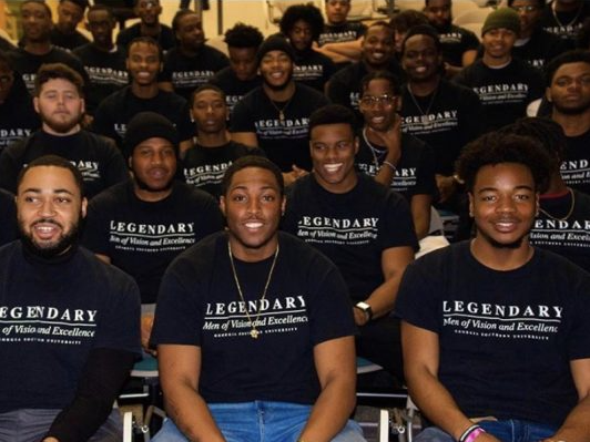 A group of MOVE participants wearing the MOVE tee shirts.