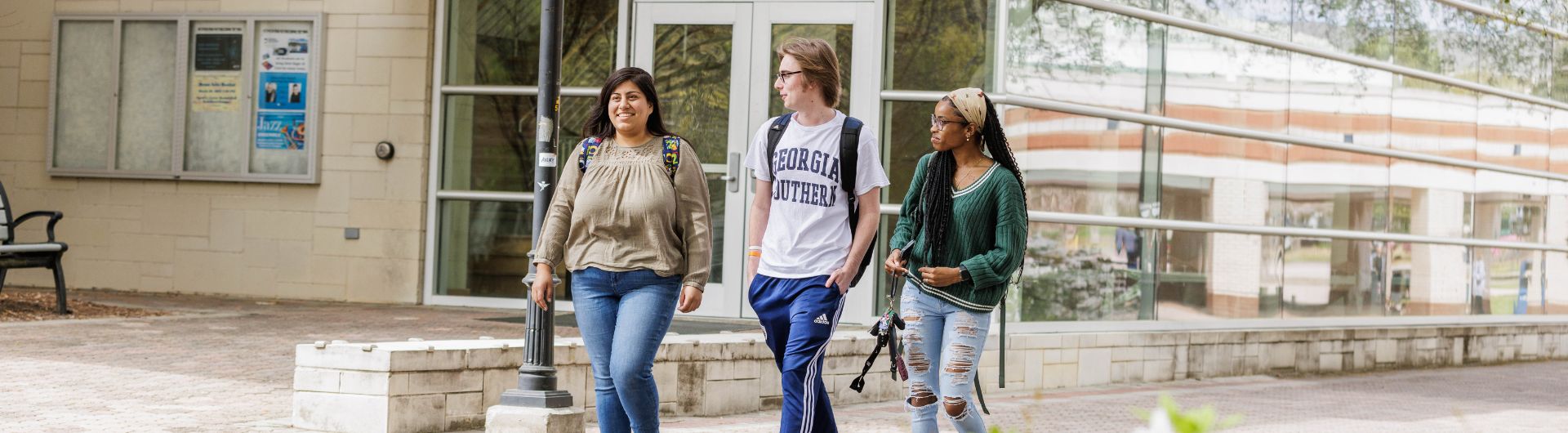 Three students walking on Georgia Southern University campus