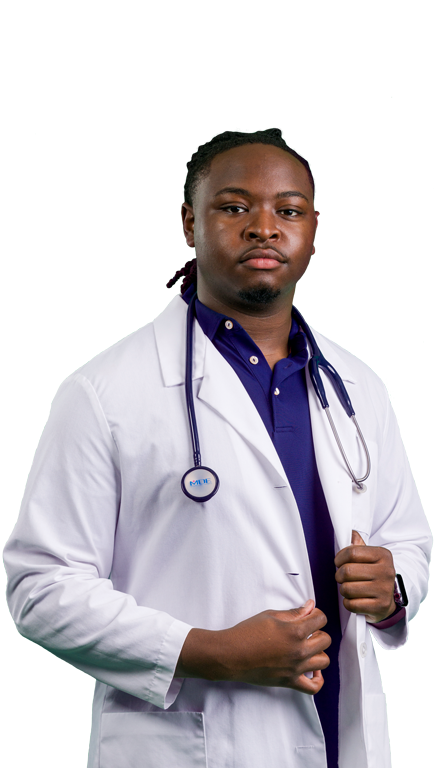 A male Georgia Southern nursing student wearing a white medical coat with a stethoscope around his neck