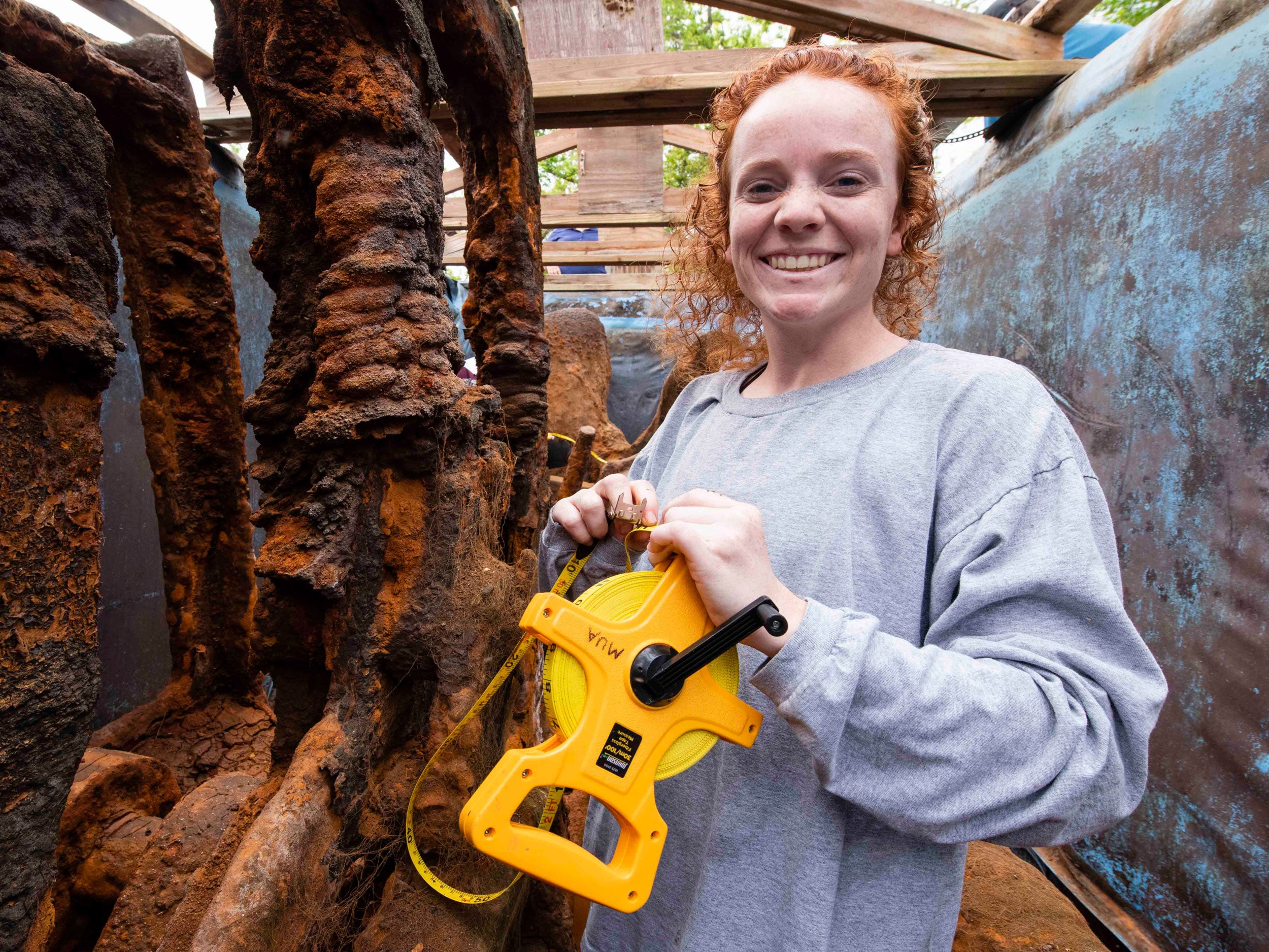 Georgia Southern student in archaeological site, immersed in historical evnironment