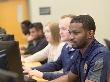 People working in a computer lab