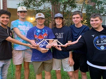 Students from Georgia Southern's Innovation Living and Learning Community, including computer science majors, show off their bridge creation