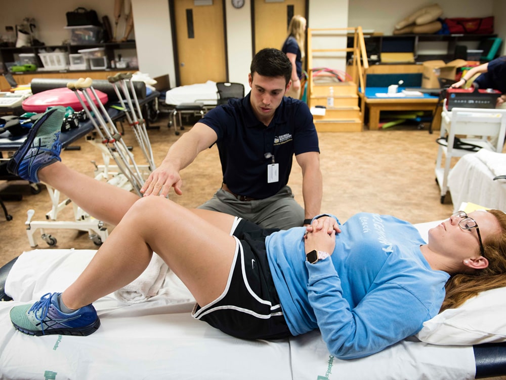 A DPT student from Georgia Southern practices conducting an assessment during a clinical practice assignment