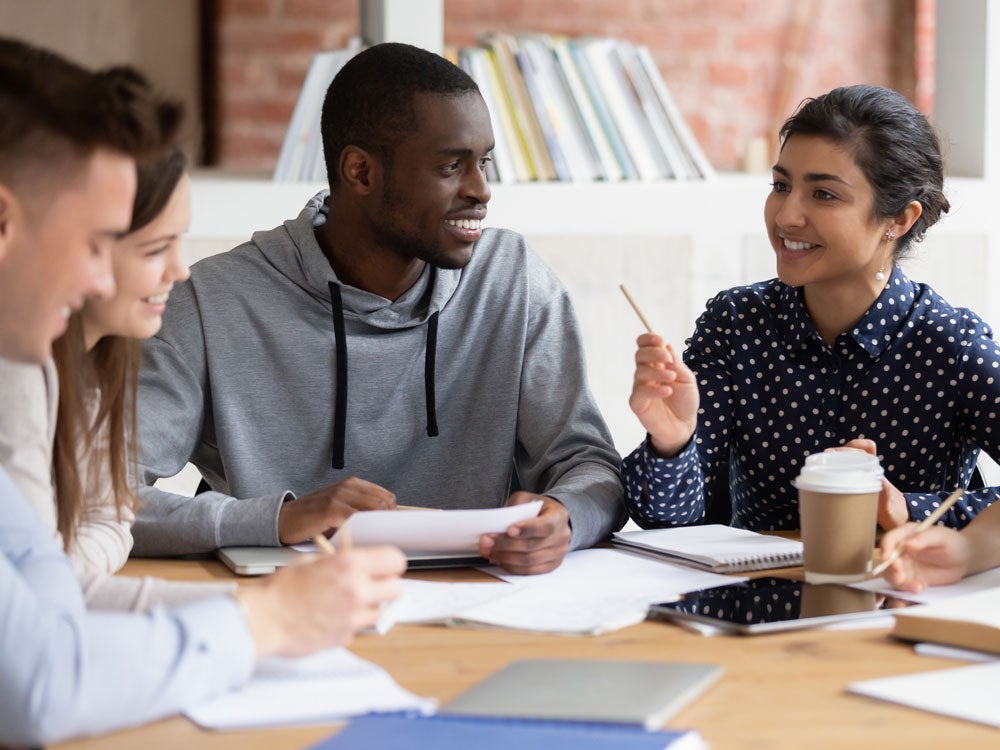 group of diverse georgia southern students, working together in educational setting