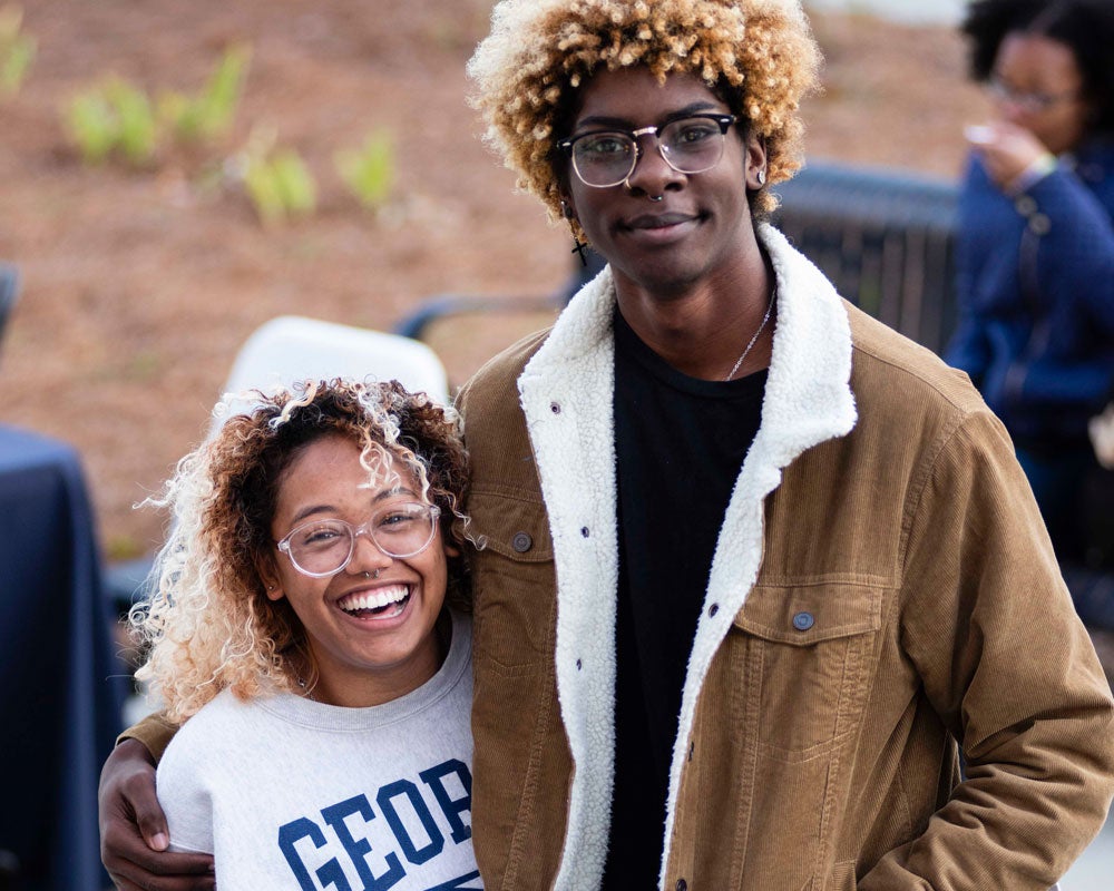 Family together on Georgia Southern campus for weekend event.